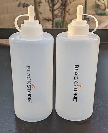 Squeeze bottles for griddle cleaning