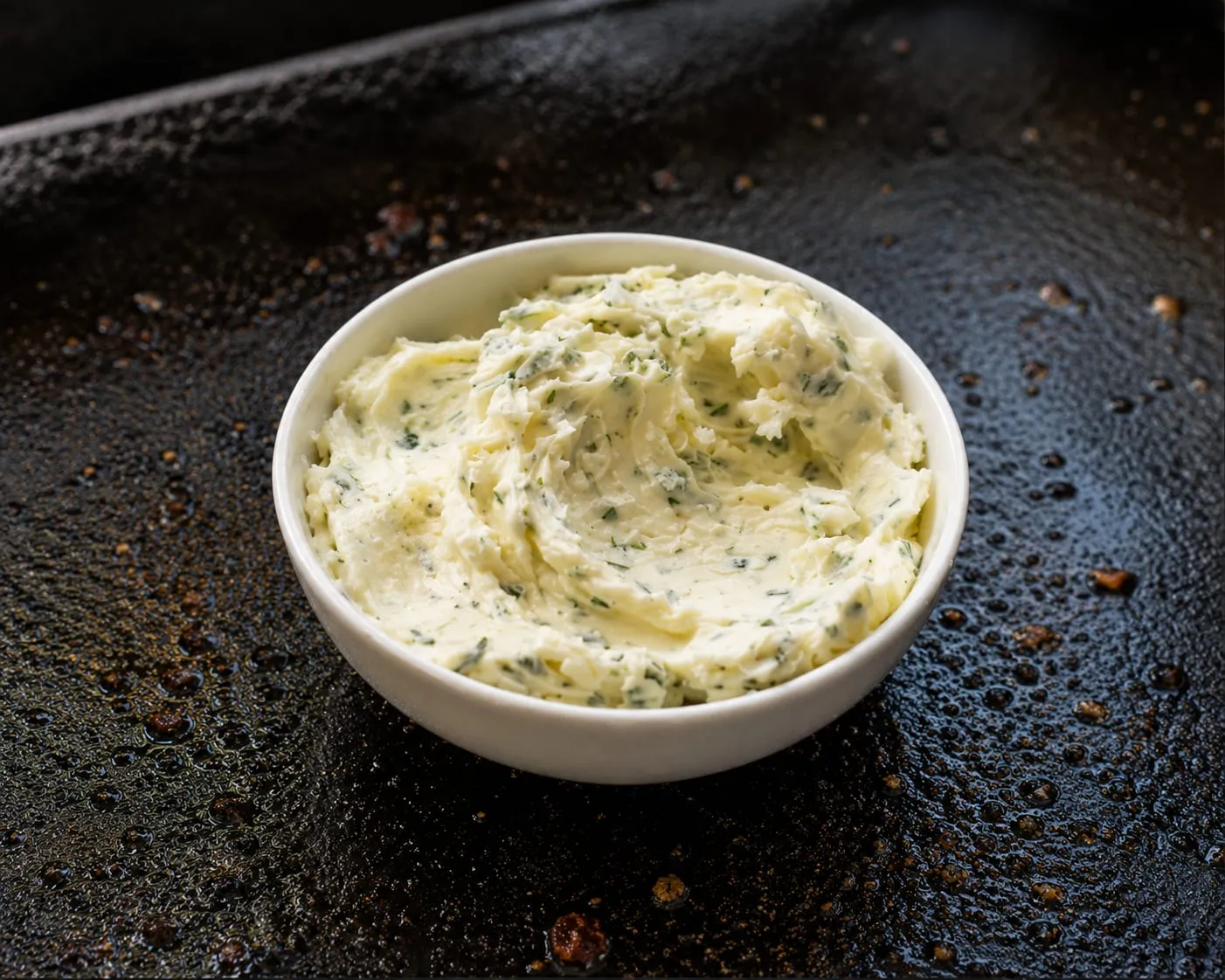 Compound garlic butter with herbs for finishing Blackstone steaks and seafood