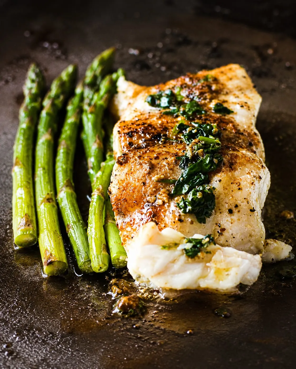 Grouper fillet with a golden garlic butter crust on a Blackstone griddle
