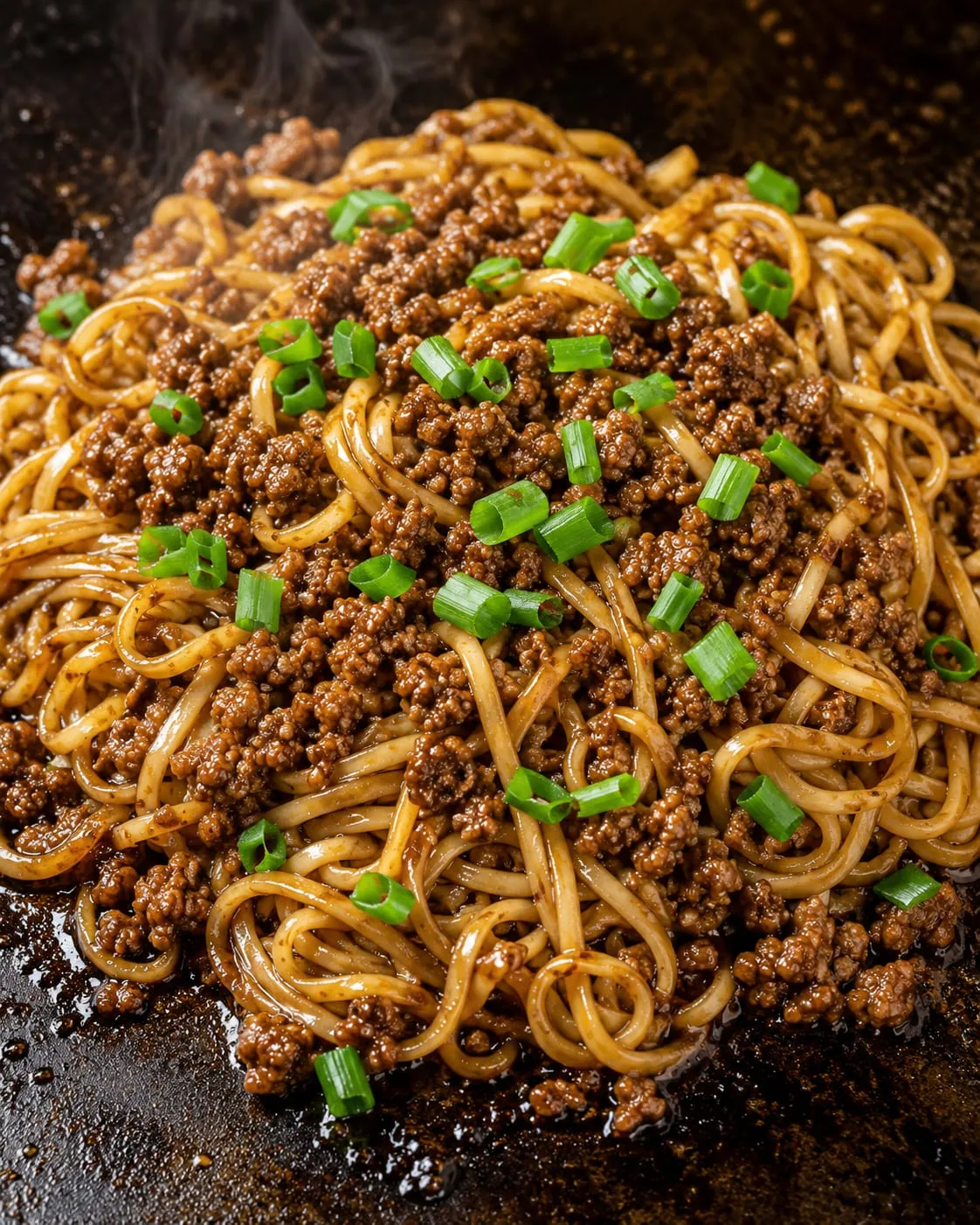 Blackstone Mongolian ground beef noodles with savory-sweet sauce on a flat-top griddle