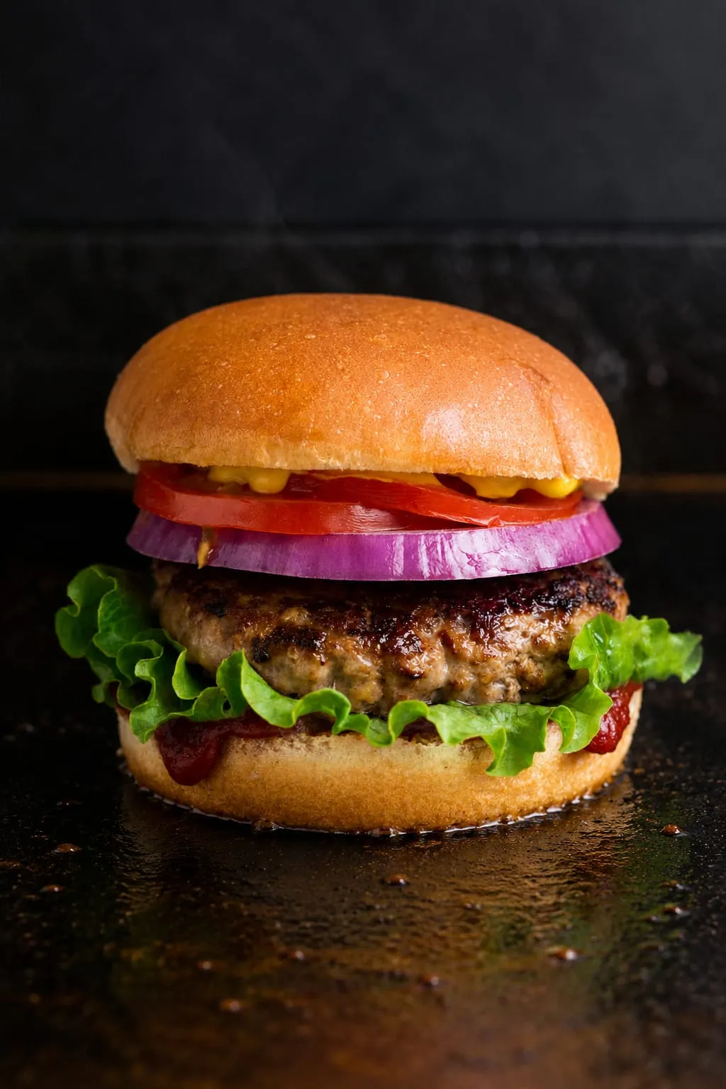 Juicy turkey burger on a Blackstone griddle with golden-seared patty